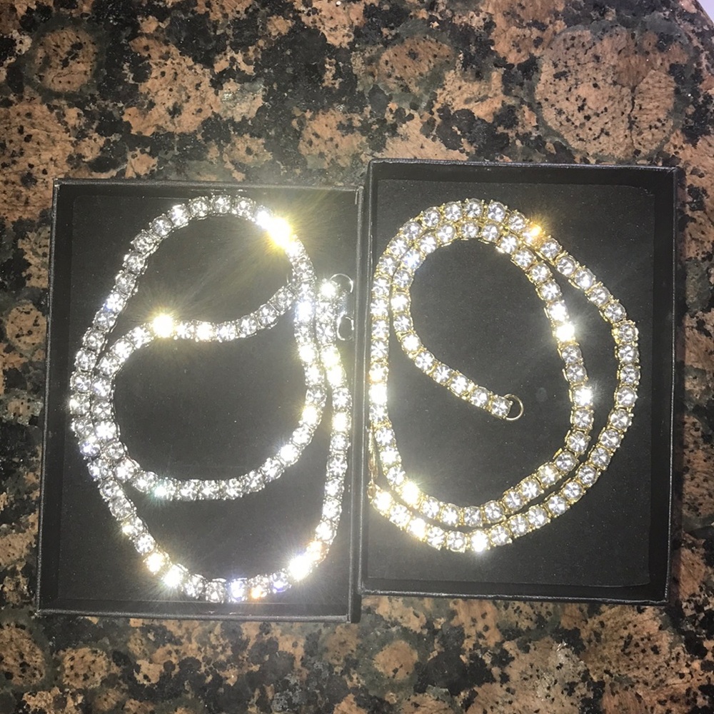 Silver and gold tennis chains